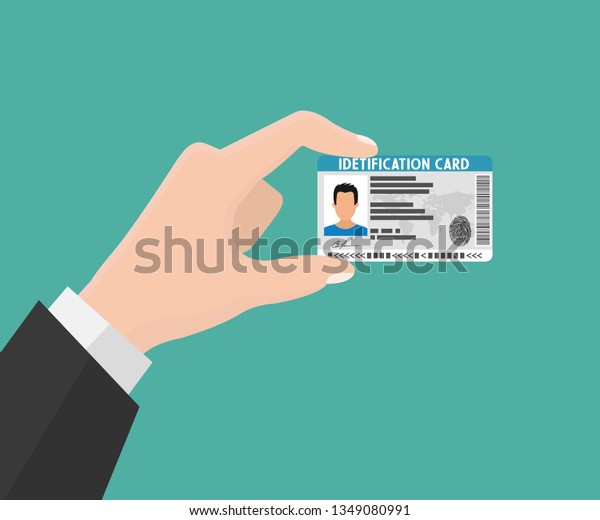 Illustration of hand holding\
the id card. Vector illustration flat design. The idea of personal\
identity. ID card, Identification card, identity verification,\
person data. 