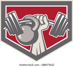 Illustration of a hand lifting weights barbell kettlebell viewed from front set inside shield crest on isolated background done in retro style.