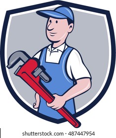 Illustration of a handyman wearing hat looking to the side holding pipe wrench viewed from front set inside crest shield on isolated background done in cartoon style. 