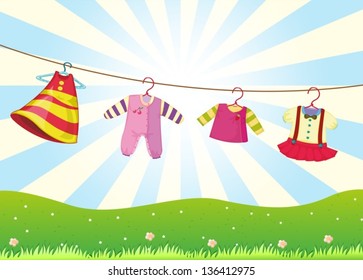 Illustration of the hanging baby clothes in the hill