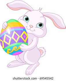 Illustration of happy Easter bunny carrying egg