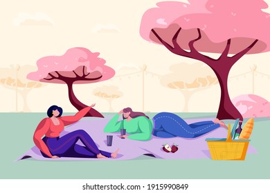 Illustration of happy friends on a park having picnic with food basket. Outside with wine and food. Girls spending time outdoor. Vector colourful cartoon landscape with trees in blossom.