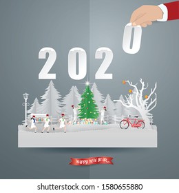 Illustration of Happy new year and Merry Christmas with Santa hand picked text 2020 on Countryside in winter season