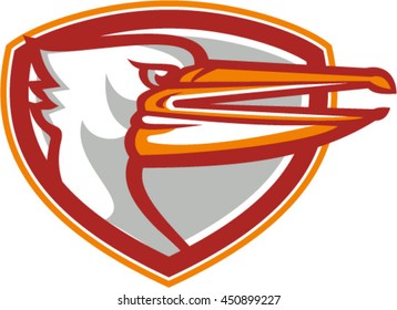 Illustration of a head of an angry pelican viewed from the side set inside shield crest on isolated  background done in retro style. 