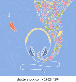 Illustration of a headphone with beautiful floral elements on blackboard. EPS 10. Transparency. No gradients.