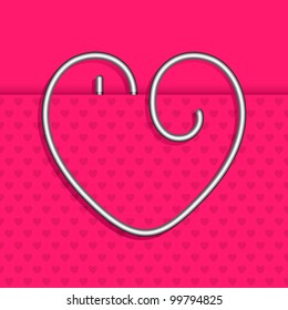 illustration of heart shape paper clip stuck in paper