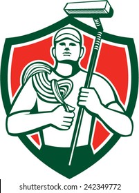 Illustration of a high rise window cleaner carrying rope and squeegee viewed from front set inside shield on isolated background done in retro style.