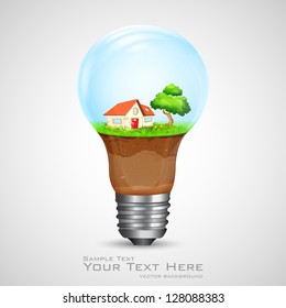 illustration of house with tree inside electric bulb