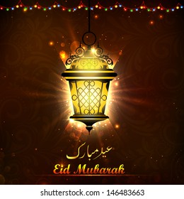 illustration of illuminated lamp on Eid Mubarak background