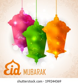 illustration of illuminated lamp on Eid Mubarak (Happy Eid) background