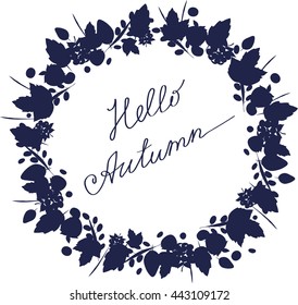 illustration with the image of a circular frame of silhouettes of leaves and berries in dark blue with the words Hello Autumn