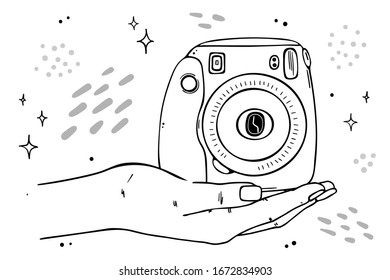 Illustration instant camera lies on the palm of your hand. Isolated on a white background.