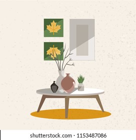 Illustration of an interior group. A table on legs with a clay vases, indoor plants and posters on the wall. Beige wall with rough texture. Flat cartoon style vector illustration.