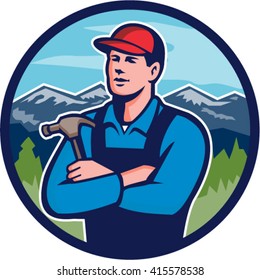 Illustration of a kitchen bathroom remodeler builder carpenter holding hammer with arms crossed viewed from front set inside circle with mountains in the background done in retro style. 