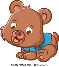 The illustration of the little bear with the brown fur is using the blue shirt and trying to crawling with his hands