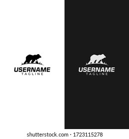 Illustration logo of a bear with its cubs on a black and white negative space.