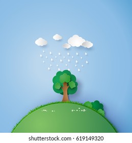 illustration of a lone tree in the field with the rain and cloud. paper art and craft style.