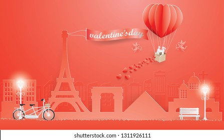 Illustration of love with Couple in red balloon and Cupid flies around on the sky coming to France on Valentine background,paper art and vector style  