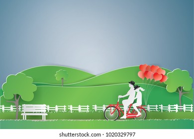 Illustration of love with two lover riding red bicycles with the red heart balloon tied on green eco background,paper craft style and illustration