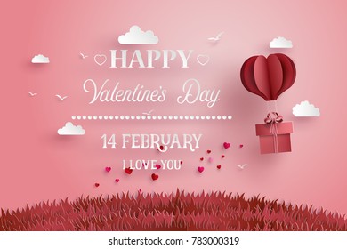 Illustration of love and valentine day,Origami made hot air balloon fly over grass with heart float on the sky.paper art and digital craft style.
