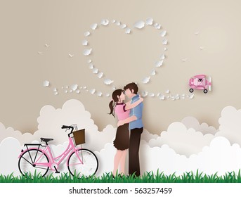 Illustration of love and valentine's Day,  with couple standing hugging on a grass field with pink bicycle and plane .paper art style.
