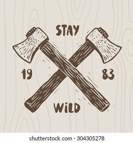 Illustration of lumberjack axes crossed. One color graphic with text