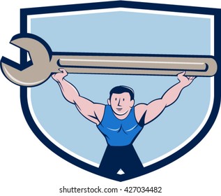Illustration of a mechanic lifting giant spanner wrench over head viewed from front set inside shield crest on isolated background done in cartoon style. 