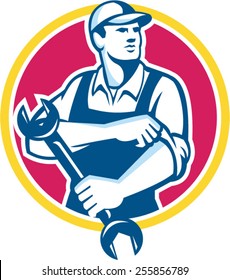Illustration of a mechanic wearing hat holding spanner wrench rolling sleeve looking to the side set inside circle on isolated background done in retro style.