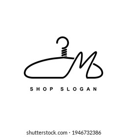 illustration of minimalist botique logo design . the elegant wire hanger icon initial capital letter M