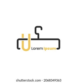 illustration of minimalist botique logo design . the elegant hanger icon initial capital letter U