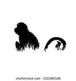 Illustration of monkey icon in the grass. Vector silhouette on white background.