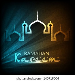  Illustration of Mosque with stylish text Ramadan Kareem glowing in light.