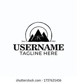 An illustration of a mountain logo design with a vintage style.