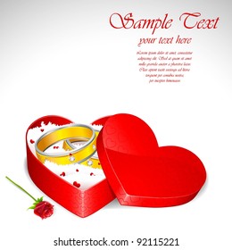 illustration of pair of engagement ring on heart shape gift box