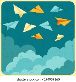 Illustration of paper planes on the sky with clouds.