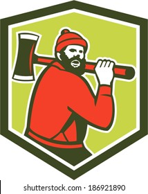 Illustration of Paul Bunyan a lumberjack sawyer forest worker carrying an axe set inside shield crest shape done in retro style on isolated background.
