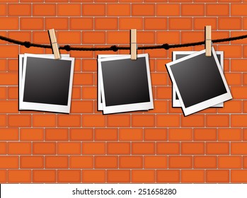 Illustration of photo frames hanging on a rope