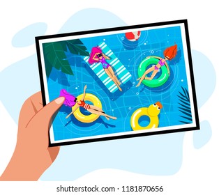 illustration of a photo in the hands of where the girls swim in the pool