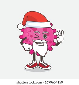 An illustration of Pink Virus cartoon santa mascot character with ok finger