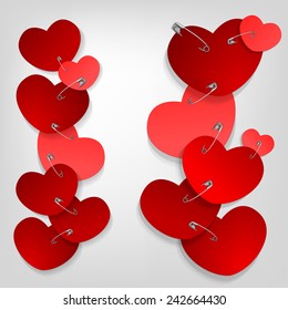 The illustration of a pinned red hearts. Vector image.