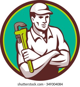 Illustration of a plumber arms crossed holding monkey wrench viewed from front set inside circle on isolated background done in retro style. 