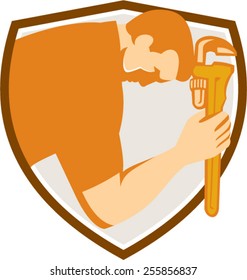 Illustration of a plumber bowing holding monkey wrench viewed from the side set inside shield crest on isolated background done in retro style. 