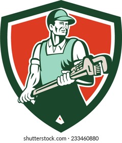 Illustration of a plumber holding giant monkey wrench set inside circle facing front done in retro style on isolated background.