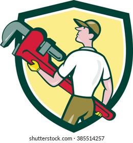 Illustration of a plumber wearing hat walking lifting giant monkey wrench looking to the side viewed from rear set inside shield crest on isolated background done in cartoon style. 