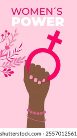 Illustration of a raised hand holding a pink feminist symbol on a soft pink background with floral accents, celebrating women’s power and equality.