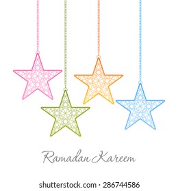 Illustration of Ramadan Kareem with intricate Arabic star shape lamps for the celebration of Muslim community festival.