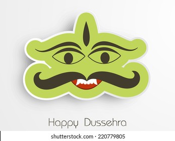 Illustration of Ravana face in funny way for sticker with Happy Dussehra text.