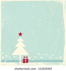 Illustration of a red Christmas tree with star topper on pale blue grunge background. Space for your copy.