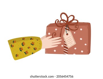 Illustration with red gift box in the hands isolated on white background. Red gift wrapping in flat style. Vector