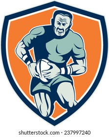 Illustration of a rugby player holding ball running charging attacking viewed from front set inside shield crest on isolated background done in retro style. 
